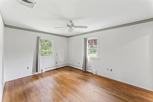 128 Walnut Tree Hill Rd, Newtown, CT 06482 - spare room with a ceiling fan, hardwood / wood-style floors, and a baseboard radiator