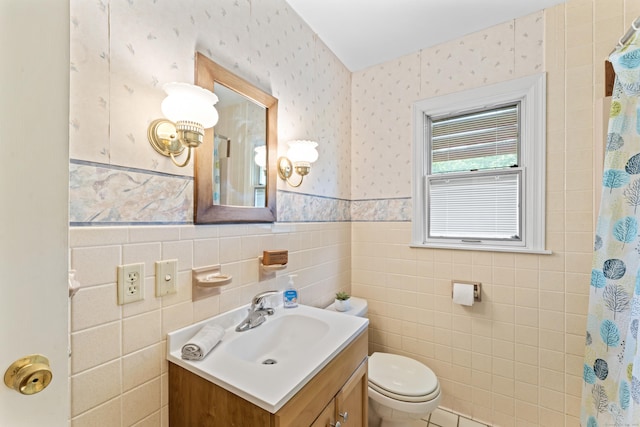 128 Walnut Tree Hill Rd, Newtown, CT 06482 - bathroom with vanity, wallpapered walls, wainscoting, tile walls, and curtained shower