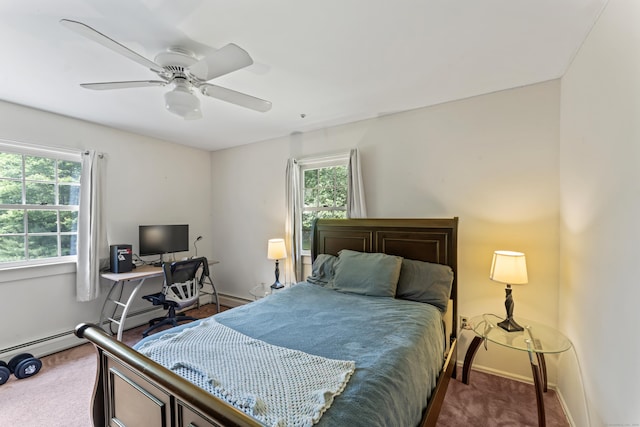 128 Walnut Tree Hill Rd, Newtown, CT 06482 - carpeted bedroom with multiple windows, a baseboard heating unit, and ceiling fan