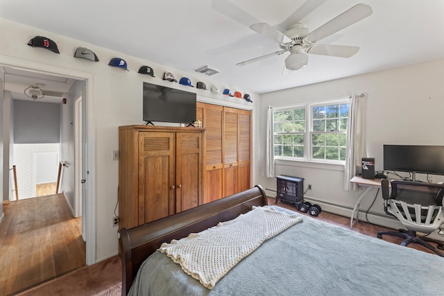 128 Walnut Tree Hill Rd, Newtown, CT 06482 - carpeted bedroom with a closet, a baseboard radiator, and ceiling fan
