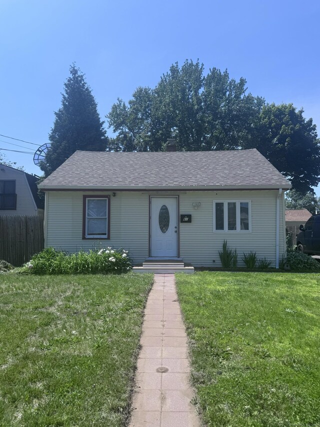 61 Naubuc Ave, East Hartford, CT 06118 - view of front of house featuring roof with shingles