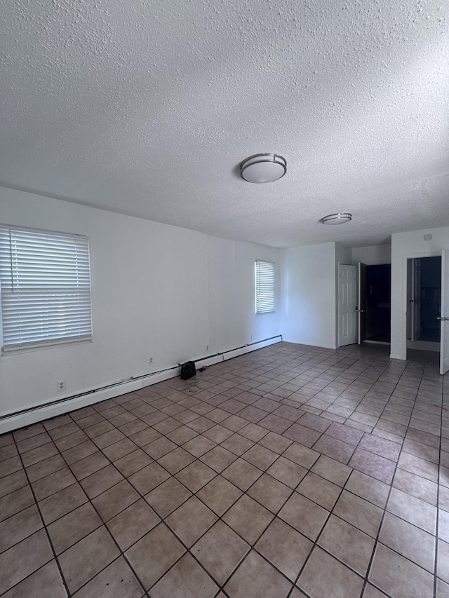 61 Naubuc Ave, East Hartford, CT 06118 - spare room with a textured ceiling