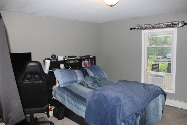 63 Bailey St, Brooklyn, CT 06234 - carpeted bedroom featuring a baseboard radiator and a desk