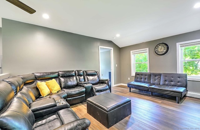 63 Bailey St, Brooklyn, CT 06234 - living room with healthy amount of natural light, light wood-type flooring, recessed lighting, vaulted ceiling, and baseboard heating