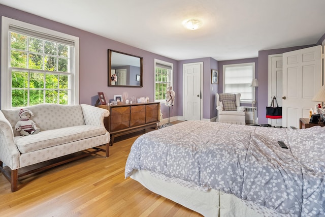 46 Dyer Ave, Canton, CT 06019 - bedroom with light wood-style floors and multiple windows