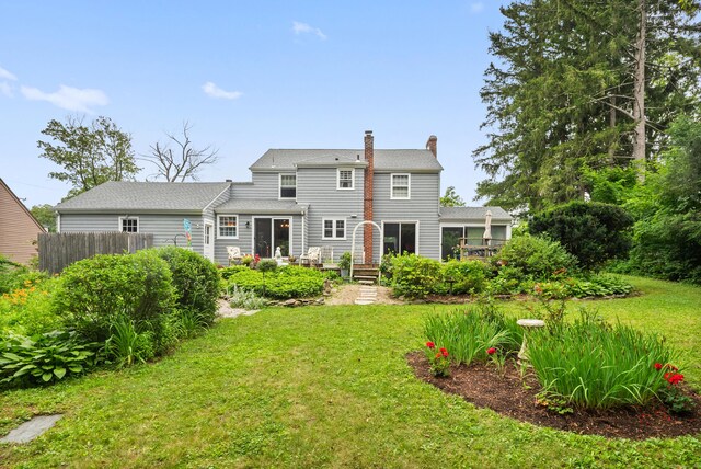 46 Dyer Ave, Canton, CT 06019 - back of property with a chimney and a deck