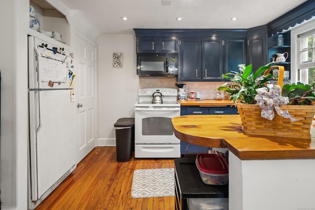 46 Dyer Ave, Canton, CT 06019 - kitchen with white appliances, wood counters, wood-type flooring, decorative backsplash, and open shelves