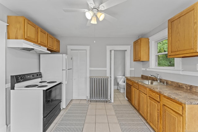 471 New Britain Rd, Berlin, CT 06037 - kitchen with radiator, electric range, under cabinet range hood, freestanding refrigerator, and ceiling fan
