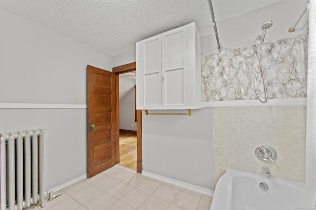 471 New Britain Rd, Berlin, CT 06037 - bathroom featuring radiator heating unit, tile patterned flooring, a textured ceiling, and tub / shower combination