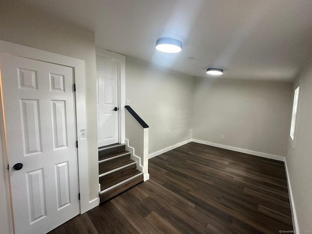 22 Hemlock Trl, Newtown, CT 06482 - basement with dark wood-type flooring, baseboards, and stairs