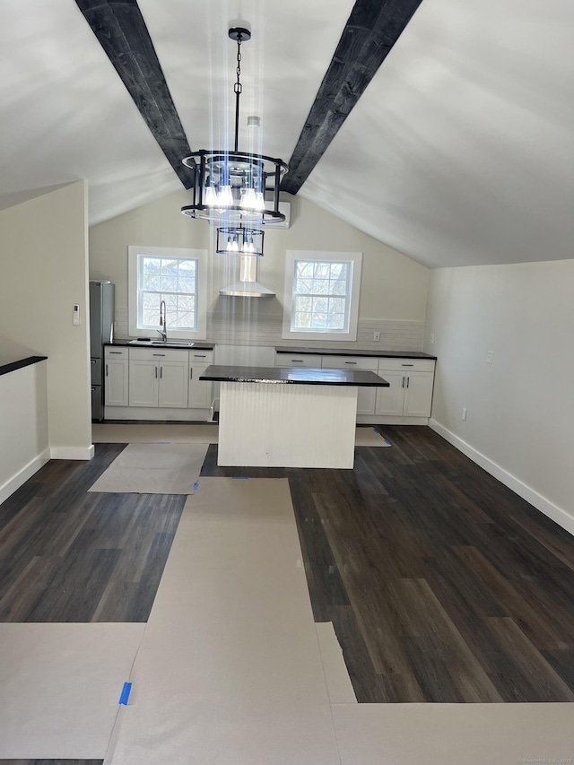 22 Hemlock Trl, Newtown, CT 06482 - kitchen featuring freestanding refrigerator, dark countertops, dark wood finished floors, and white cabinetry