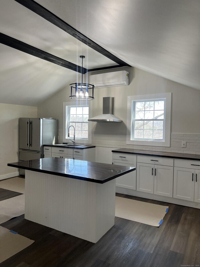 22 Hemlock Trl, Newtown, CT 06482 - kitchen with wall chimney exhaust hood, dark countertops, a sink, and an AC wall unit