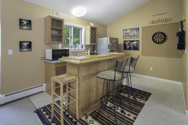 1729 Litchfield Rd, Watertown, CT 06795 - bar with freestanding refrigerator, black microwave, vaulted ceiling, light carpet, and baseboards
