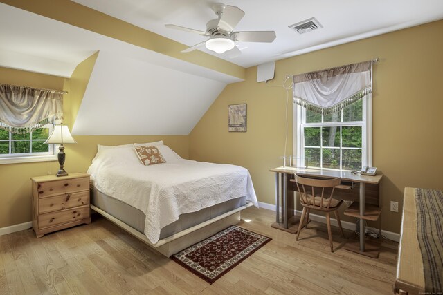 1729 Litchfield Rd, Watertown, CT 06795 - bedroom with multiple windows, wood finished floors, baseboards, and lofted ceiling