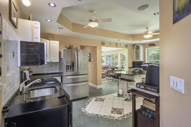 1729 Litchfield Rd, Watertown, CT 06795 - kitchen featuring stainless steel fridge with ice dispenser, a ceiling fan, a sink, tile patterned flooring, and recessed lighting