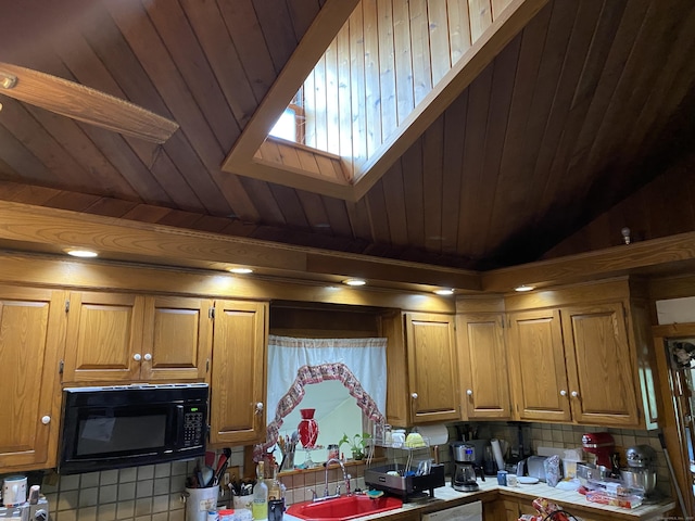 1045 Thomaston Rd, Watertown, CT 06795 - kitchen featuring black microwave, a sink, tile patterned flooring, brown cabinetry, and wooden ceiling
