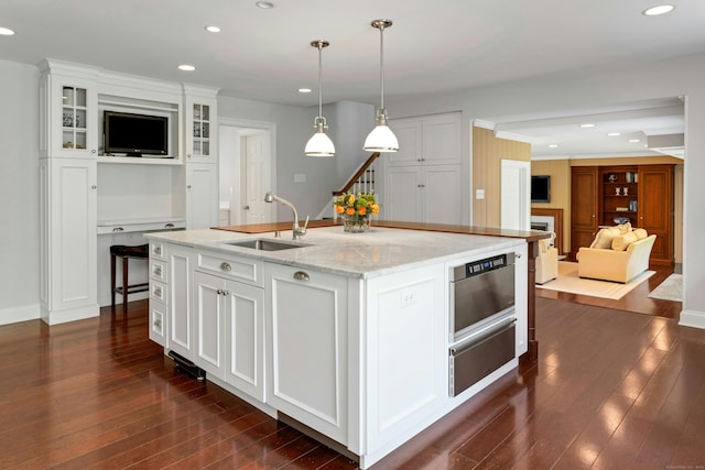 4 The Fenway, Westport, CT 06880 - kitchen with a warming drawer, dark wood-style floors, white cabinets, and recessed lighting