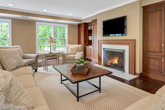 4 The Fenway, Westport, CT 06880 - living room with plenty of natural light, ornamental molding, a premium fireplace, wood finished floors, and recessed lighting