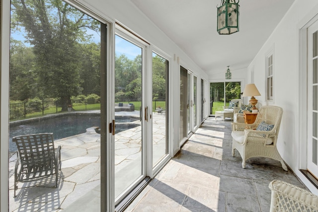 4 The Fenway, Westport, CT 06880 - sunroom with healthy amount of natural light, stone tile flooring, and lofted ceiling