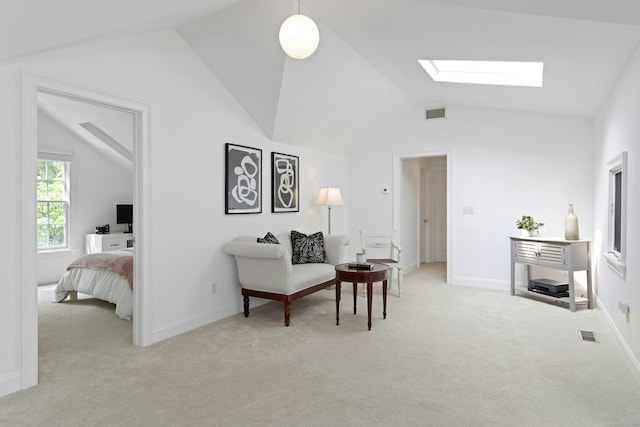 4 The Fenway, Westport, CT 06880 - living area with vaulted ceiling, light colored carpet, and a skylight