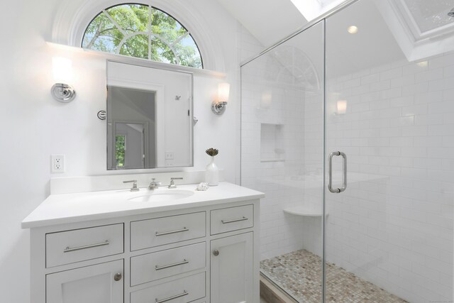 4 The Fenway, Westport, CT 06880 - full bathroom featuring vanity, a shower stall, and a skylight