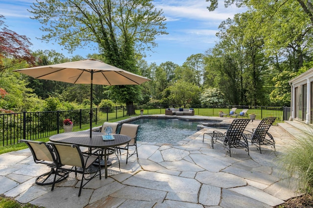 4 The Fenway, Westport, CT 06880 - view of swimming pool featuring a patio area, outdoor dining space, a fenced backyard, an outdoor living space, and view of wooded area