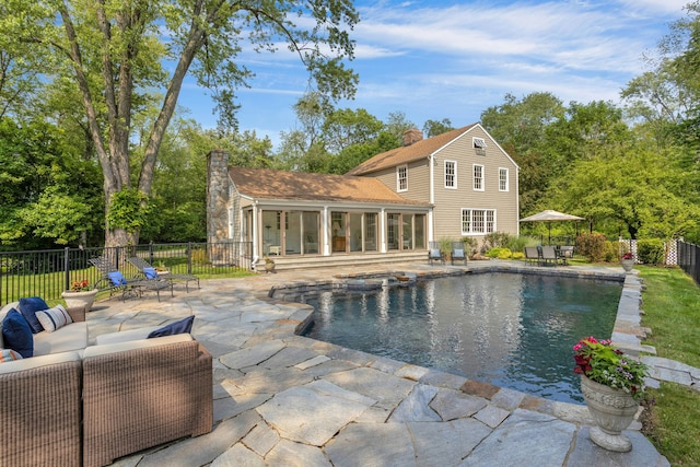 4 The Fenway, Westport, CT 06880 - view of swimming pool featuring a patio area, an exterior structure, a fenced backyard, a pool with connected hot tub, and an outbuilding