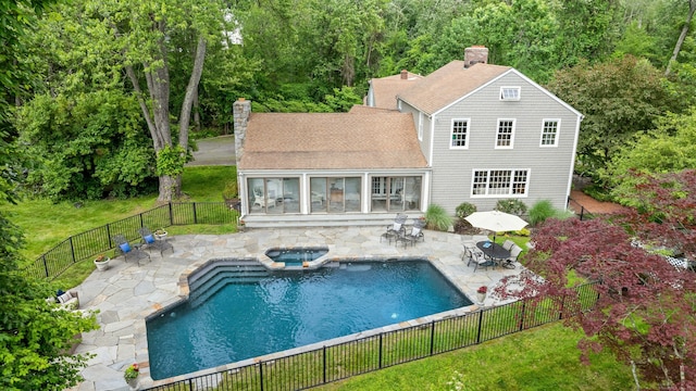 4 The Fenway, Westport, CT 06880 - view of pool featuring a fenced backyard, a patio, a pool with connected hot tub, and outdoor dining space