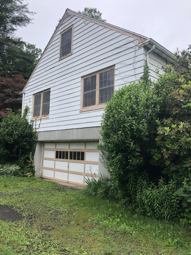 50 Richard Dr, Hamden, CT 06514 - view of home's exterior with a garage