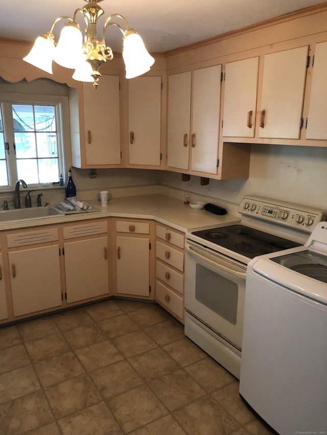 50 Richard Dr, Hamden, CT 06514 - kitchen featuring washer / dryer, white electric range, a chandelier, light countertops, and decorative light fixtures