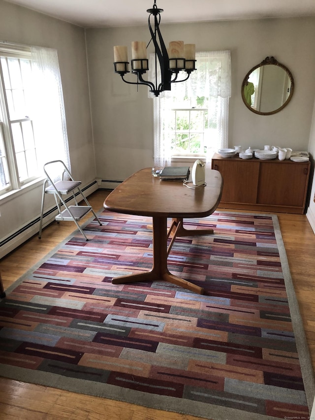 50 Richard Dr, Hamden, CT 06514 - dining area with wood finished floors and a chandelier
