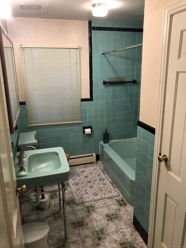 50 Richard Dr, Hamden, CT 06514 - bathroom with tile walls, baseboard heating, tile patterned floors, and wainscoting