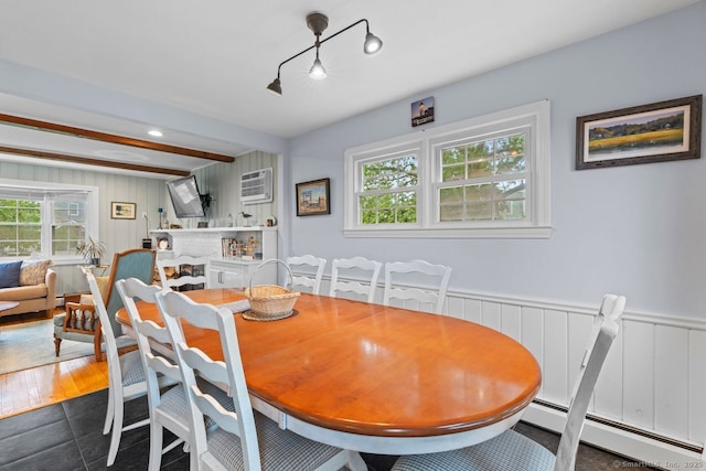 52 Seaside Ave, Guilford, CT 06437 - tiled dining space featuring baseboard heating, a decorative wall, beamed ceiling, and a wall mounted air conditioner