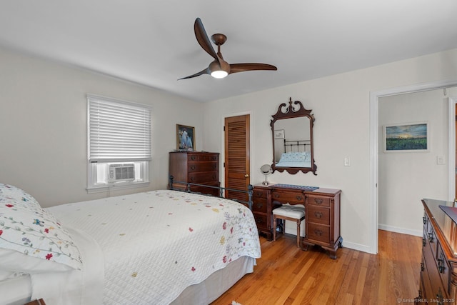 52 Seaside Ave, Guilford, CT 06437 - bedroom with light wood-type flooring, a closet, cooling unit, and ceiling fan