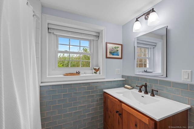 52 Seaside Ave, Guilford, CT 06437 - bathroom featuring vanity, tile walls, a wainscoted wall, and a shower with shower curtain