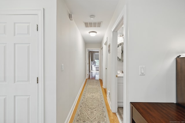 67 Southwick Ct Unit 67, Cheshire, CT 06410 - hallway with light wood-style flooring and baseboards