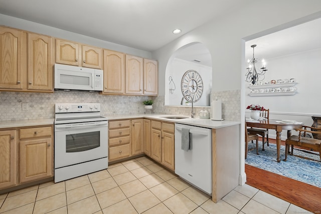 67 Southwick Ct Unit 67, Cheshire, CT 06410 - kitchen featuring white appliances, light brown cabinetry, light countertops, and recessed lighting
