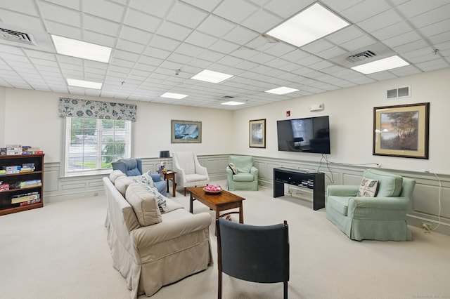 67 Southwick Ct Unit 67, Cheshire, CT 06410 - carpeted living area with a paneled ceiling and a wainscoted wall