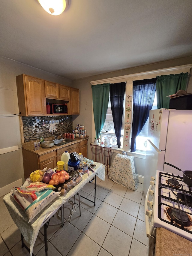 516 Dixwell Ave, New Haven, CT 06511 - kitchen featuring white appliances, light tile patterned floors, tasteful backsplash, and light countertops