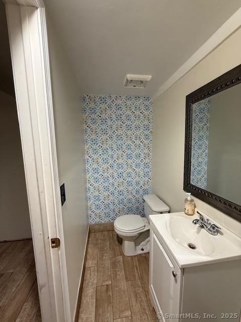 246 Sheffield Ave, New Haven, CT 06511 - bathroom with wood finished floors and vanity