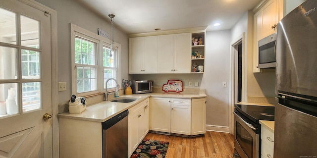 4 Tryon Rd, Norwalk, CT 06851 - kitchen featuring stainless steel appliances, light wood-type flooring, light countertops, and recessed lighting