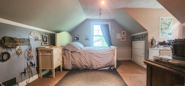 4 Tryon Rd, Norwalk, CT 06851 - bedroom with light carpet, vaulted ceiling, a textured ceiling, and wainscoting