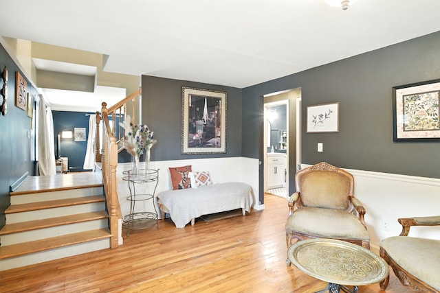 95 Lauter Ave, Windham, CT 06226 - sitting room featuring stairway, wood finished floors, and wainscoting