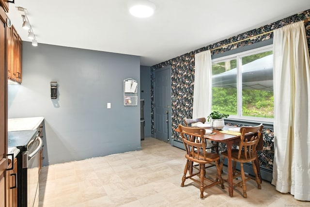 95 Lauter Ave, Windham, CT 06226 - dining area with rail lighting and light floors