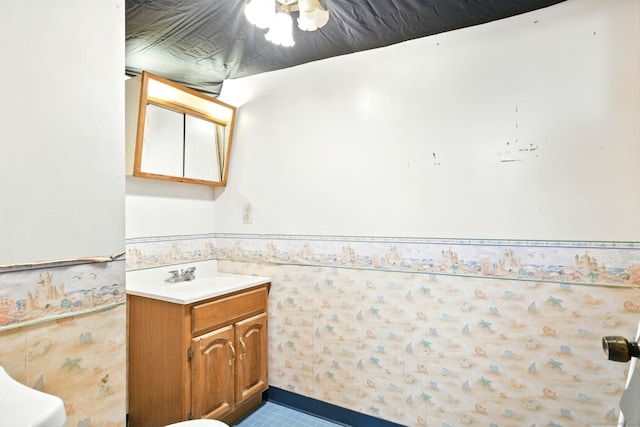 95 Lauter Ave, Windham, CT 06226 - bathroom with vanity and a wainscoted wall