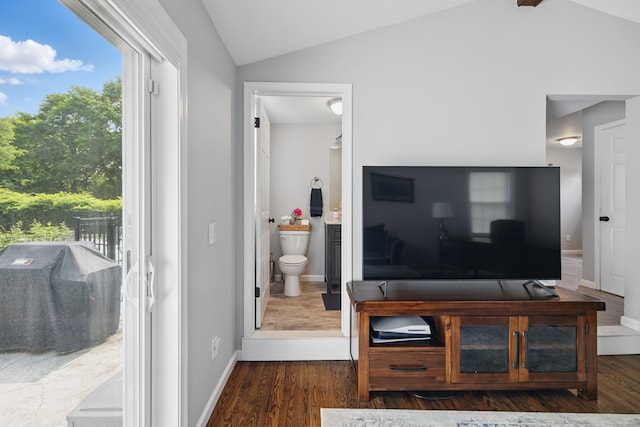 197 Webb Rd, Naugatuck, CT 06770 - living area featuring vaulted ceiling, wood finished floors, and baseboards