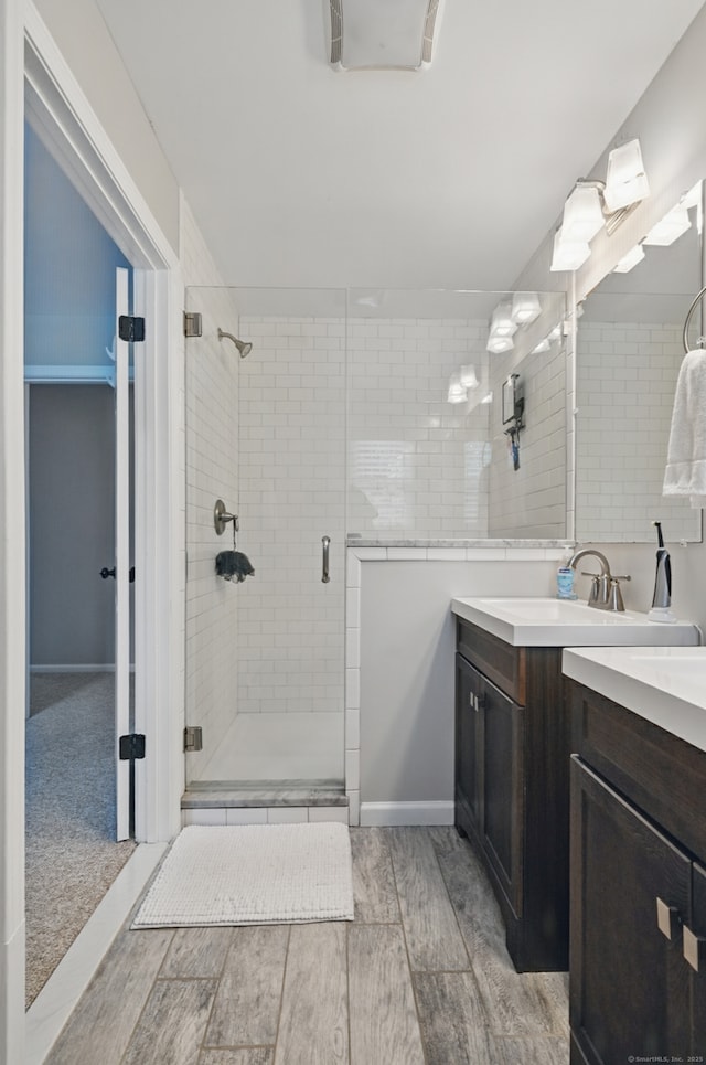 197 Webb Rd, Naugatuck, CT 06770 - full bath featuring a shower stall, vanity, and wood finished floors