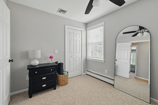 197 Webb Rd, Naugatuck, CT 06770 - carpeted bedroom with a baseboard radiator, a closet, baseboards, and ceiling fan