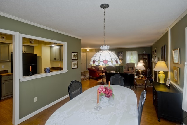11 Oxford Dr Unit 11, Suffield, CT 06078 - dining space with wood finished floors and ornamental molding