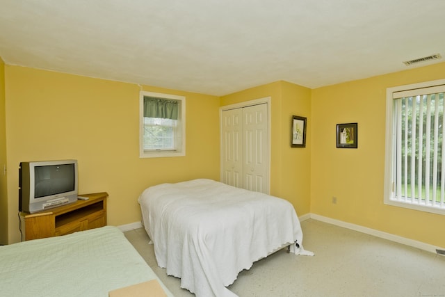 11 Oxford Dr Unit 11, Suffield, CT 06078 - bedroom featuring baseboards and a closet